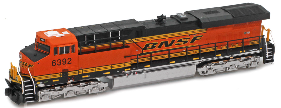 Model train locomotive with BNSF logo on a white background