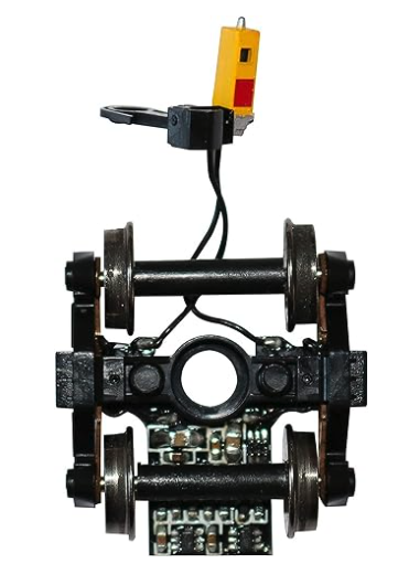 Black HO Scale end of train device with track-powered flashing LED, featuring metal wheels and E-Z Mate Mark II couplers.