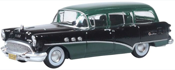 A green and black 1954 Buick Century Estate Wagon model car in HO scale, showing the front three-quarter view with details such as the grille, windows, and wheels.