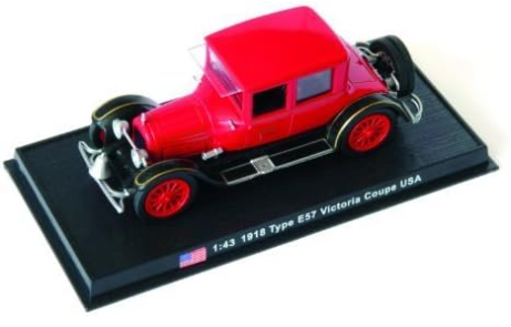 A red diecast model of a 1918 Victoria Couple fire truck, with detailed accoutrements and markings, on a black base with an American flag.
