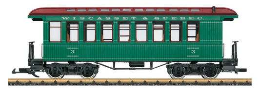 A model of a green and red Wiscasset, Waterville & Farmington passenger car with prototypical paint and lettering, featuring open doors and metal wheelsets.