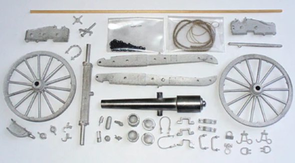 Model train kit with various components on a white background