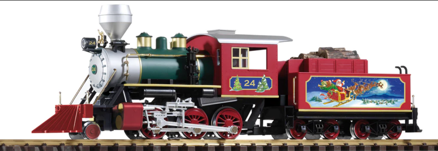 A detailed model of a red and green PIKO 38230 NORTH POLE EXPRESS MOGUL LOCOMOTIVE #24 with a Christmas tree on the side, equipped with lights and a 5-pole motor.