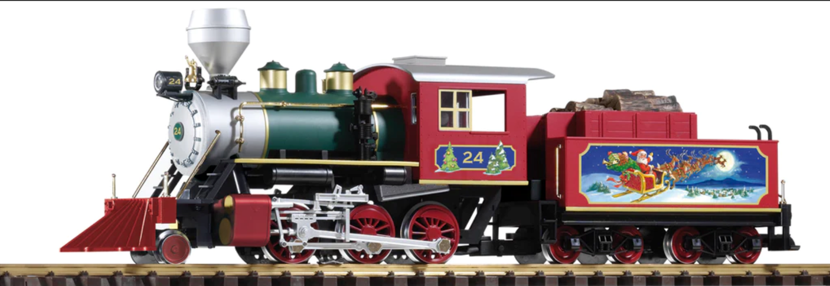A detailed model of a red and green PIKO 38230 NORTH POLE EXPRESS MOGUL LOCOMOTIVE #24 with a Christmas tree on the side, equipped with lights and a 5-pole motor.