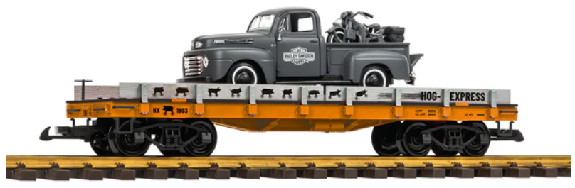 Flatcar with a truck and motorcycle