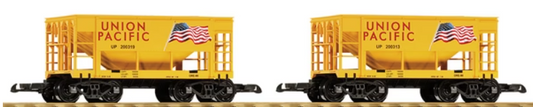 Two single-bay, open-top yellow ore cars with black details, designed for G-scale model railroads.