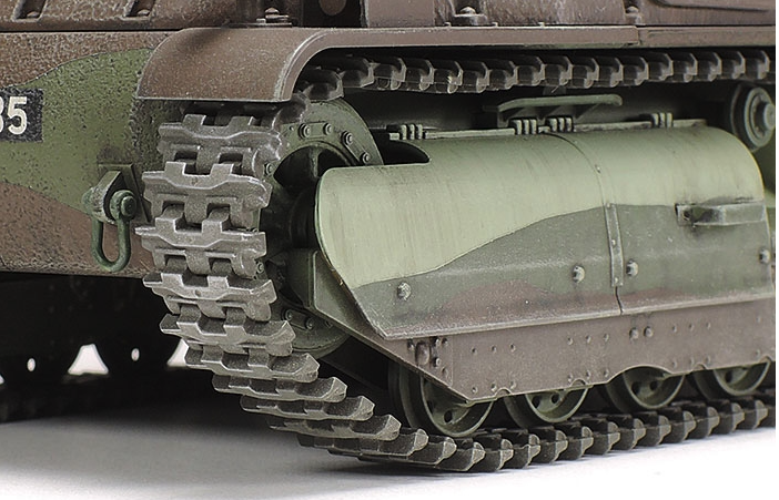Close-up of a tank's履带 (tracks) on a white background