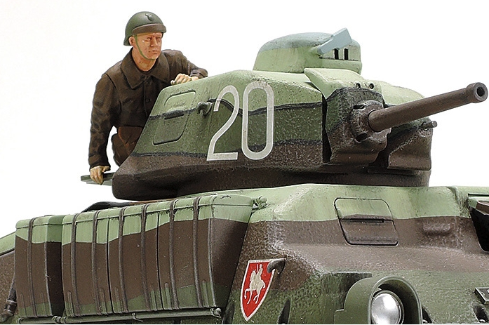 Model tank with a person standing on top, featuring the number '20' on a white background.