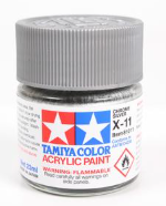 Bottle of Tamiya Color acrylic paint with a silver cap