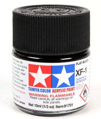 Tamiya Color acrylic paint jar with black lid on a white background