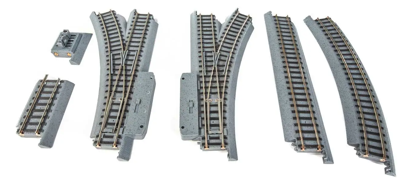 Set of model train tracks on a white background