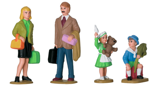 A set of four miniature figures designed for model train setups, depicting a family with various outfits, including a man in a suit, a woman in a green coat, a girl in a green dress, and a boy holding a Hobby horse