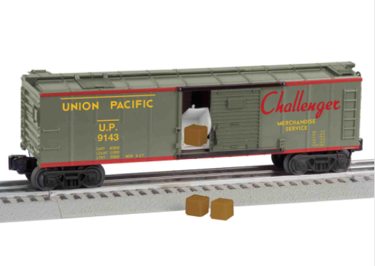 A green and red toy train merchandise car with the Union Pacific logo, featuring a roof hatch and die-cast metal trucks.