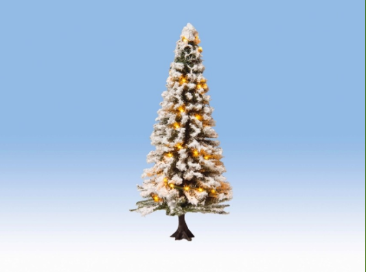 A white lighted Christmas tree with LED lights, designed for 1:160 scale model railways, depicted against a blue background.