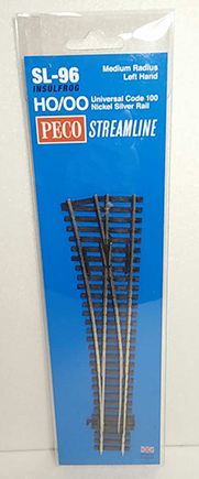 Packaged model train turnout track pieces labeled as PECO SL-96, medium radius left hand, on a blue background.