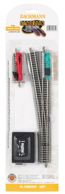 Bachmann Model Railways 66 Tornado - Left switch set in its original blister card packaging, featuring a black electric motor, red and green switches, and silver switch rails.