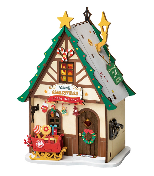 Decorative Christmas house with festive elements on a white background