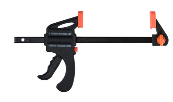 Black and orange clamp on a white background