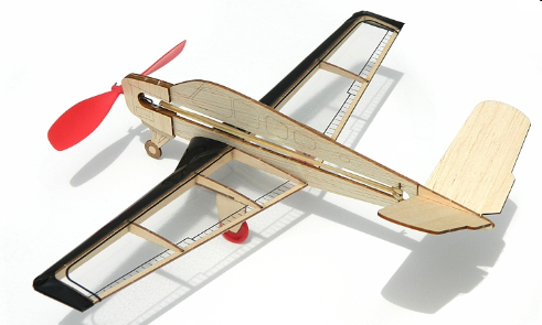Wooden model airplane with red propeller on a white background