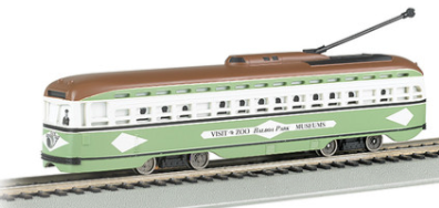 Green and white streetcar