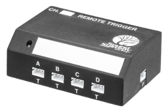 A black remote trigger box with white text and labels, featuring four input ports labeled A, B, C, and D, on a plain white background.