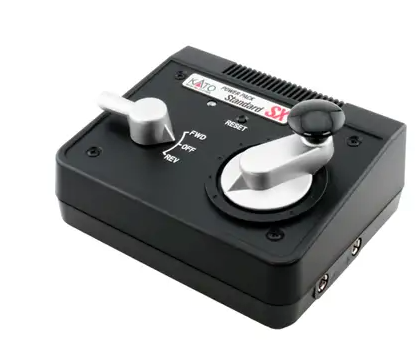 A black LEO Standard 3X power supply unit with a large silver and black rotary dial, a smaller silver switch, and a small red and white logo label on the top surface, shown against a plain white background.