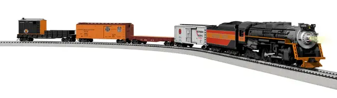 Model train set with locomotive and cars on a track