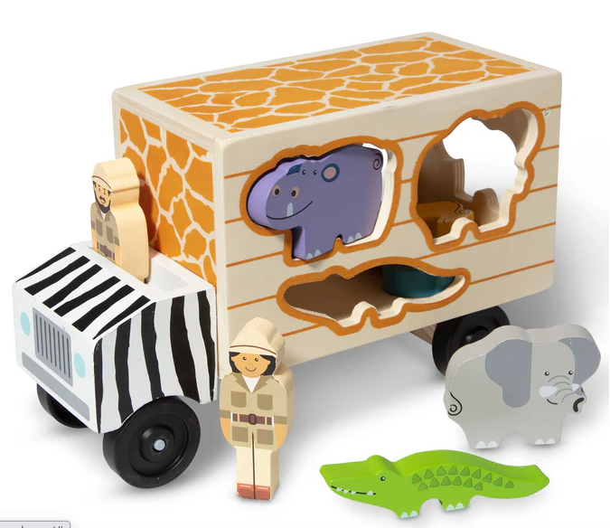 Wooden toy set with a truck, animals, and a figure on a white background