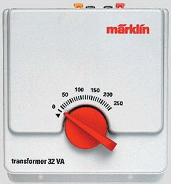 A white Marklin transformer with a red knob, designed for HO scale model railways, with measurements displayed on the side.