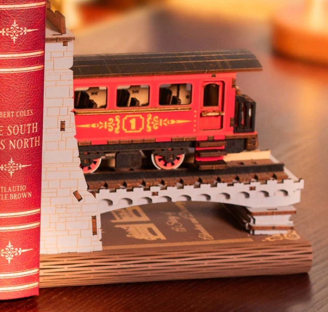 Model train on a book with a blurred background