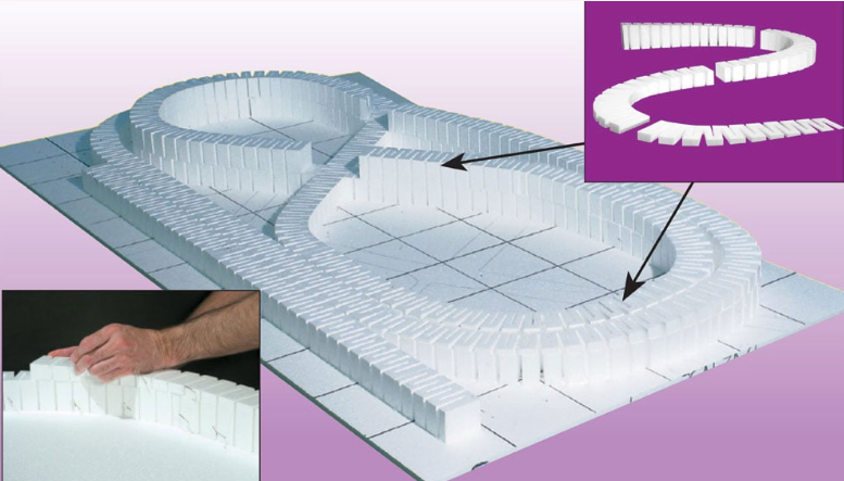 3D model of a curved pathway with white blocks and a close-up of a hand placing a block.