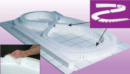 3D model of a curved pathway with white blocks and a close-up of a hand placing a block.