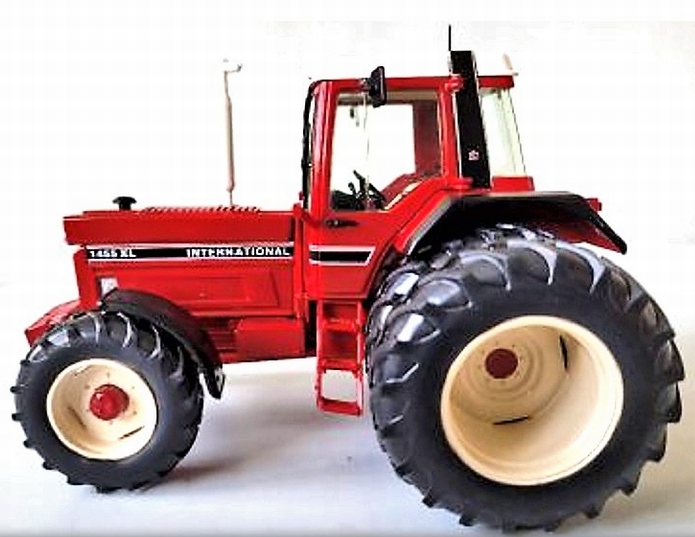 Red International tractor with dual rear wheels