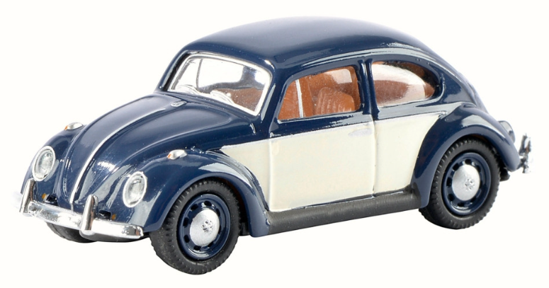 A Schuco Piccolo Volkswagen Beetle scale model in beige and blue colors.