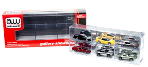 A clear plastic display case with a six-car model vehicle set, including a red car, a black car, a yellow car, a silver car, a red truck, and a black racing car.