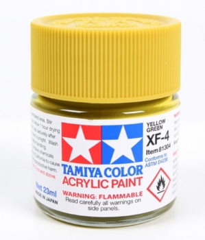 bottle of yellow green paint