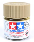 Tamiya Color acrylic paint bottle with gold color swatch on a white background