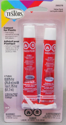 Two tubes of Testors cement for plastic in a packaging with Testors branding.