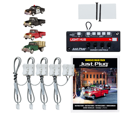 Collection of model cars, light hub, and wiring harnesses with Just Plug branding on a white background.