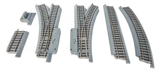 Set of model train tracks on a white background
