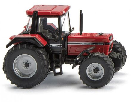 Model of a red tractor on a white background