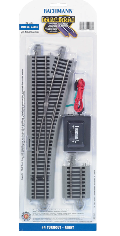 Bachmann HO Scale E-Z Track #4 Turnout, with gray roadbed and black ties, including a straight track and a direction switch.