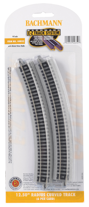 A set of six curved track pieces for a model train layout, packaged in a clear plastic box with a white background. The tracks are nickel silver with a gray roadbed.
