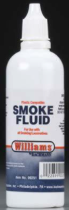 A bottle of Bachmann Smoke Fluid, which is a fluid used for creating smoke effects with model trains.
