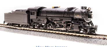 Black steam engine and tender