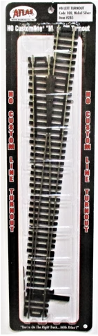 HO Scale Atlas 285 Code 100 Left-Hand #8 Mark IV Turnout/Switch packaged in a clear plastic box with a black background displaying the product. It includes nickel silver rail and black plastic ties that match curved other Atlas Code 100 trackage.