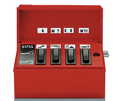 A red momentary control box with multiple rocker switches and connection ports for model train accessories.