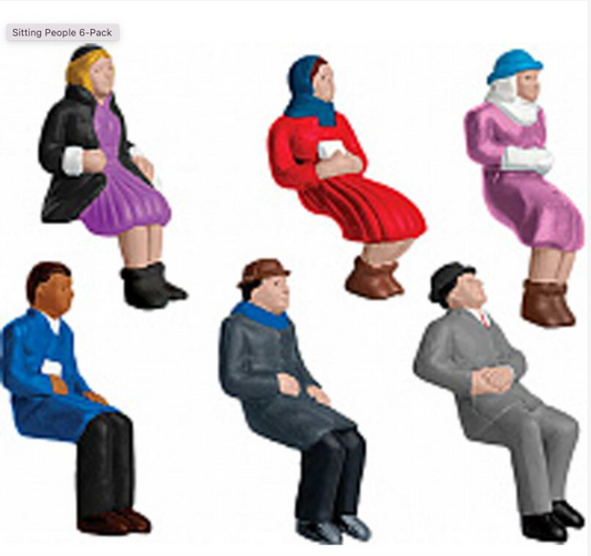 A set of six miniature figures designed for toy trains, depicting various seated people in different outfits.