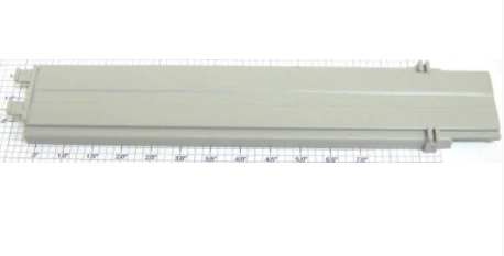 A beige-colored toy train component, possibly a part of a culvert unloader system.