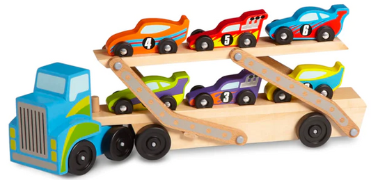 A large wooden race-car carrier toy with multiple levels, loaded with six colorful wooden race cars numbered and designed uniquely.